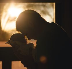 Father holding baby