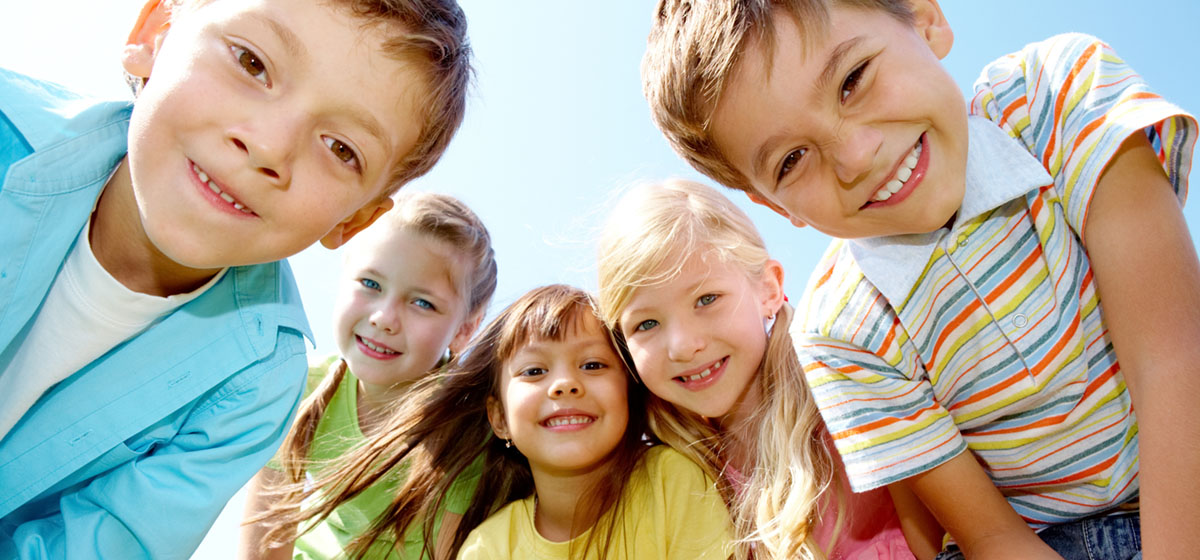 Portrait of children and young people outdoor looking at camera