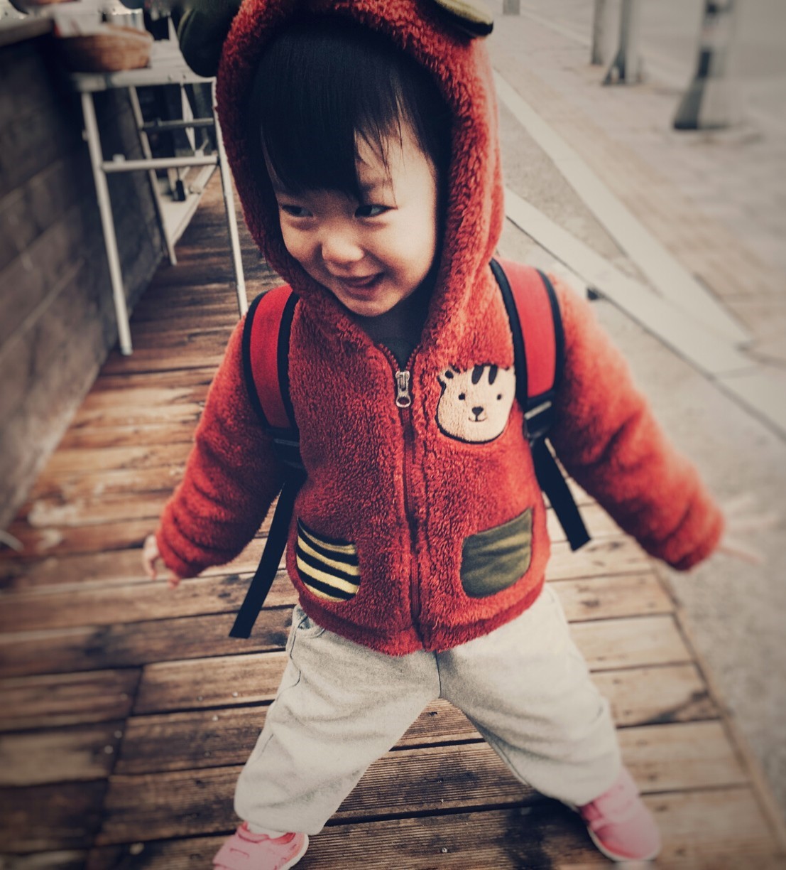 child in red coat