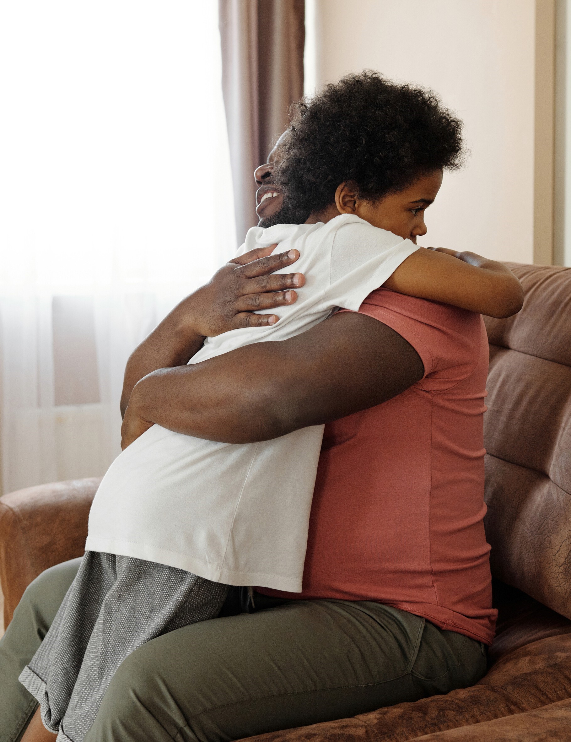 father and daughter hugging
