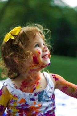 girl covered in paint